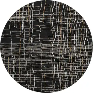Photo of 8' Black Ivory And Beige Striped Washable Round Rug With UV Protection