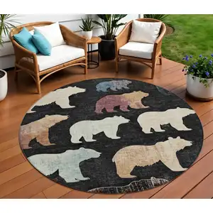 Photo of 8' Black Ivory And Brown Round Animal Print Washable Indoor Outdoor Area Rug