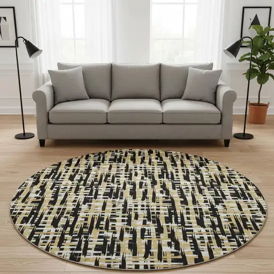 8' Black Ivory And Gold Abstract Geometric Washable Round Rug With UV Protection Photo 2