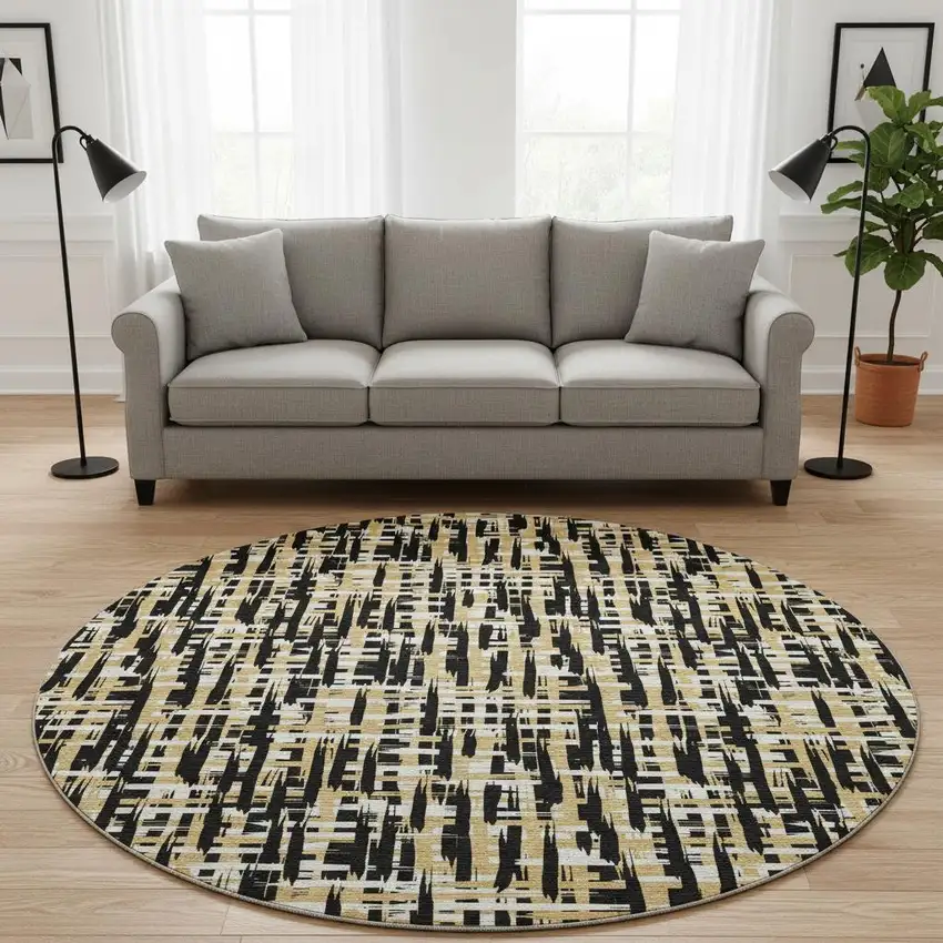 8' Black Ivory And Gold Abstract Geometric Washable Round Rug With UV Protection Photo 2
