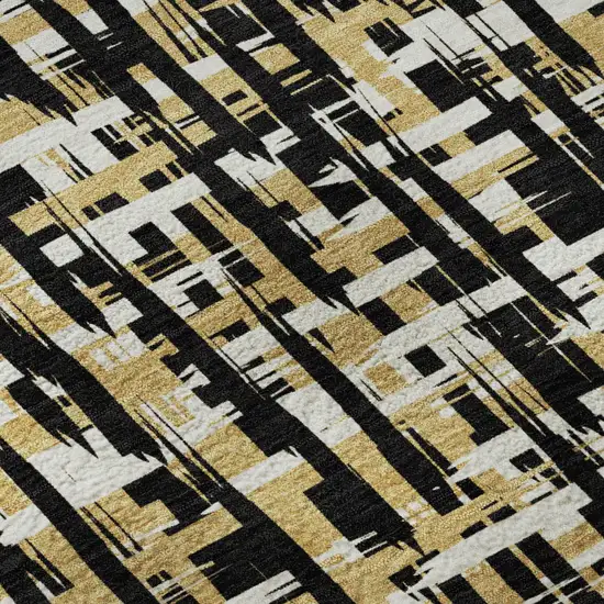 8' Black Ivory And Gold Abstract Geometric Washable Round Rug With UV Protection Photo 8