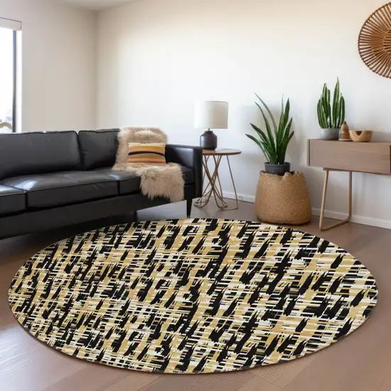 8' Black Ivory And Gold Abstract Geometric Washable Round Rug With UV Protection Photo 4