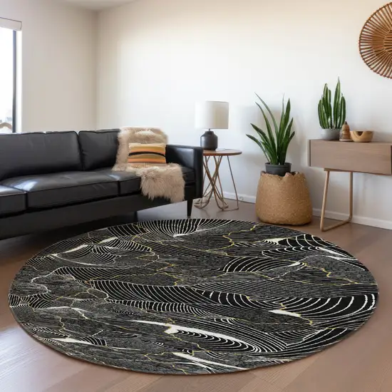 8' Black Ivory And Gold Abstract Washable Round Rug With UV Protection Photo 4