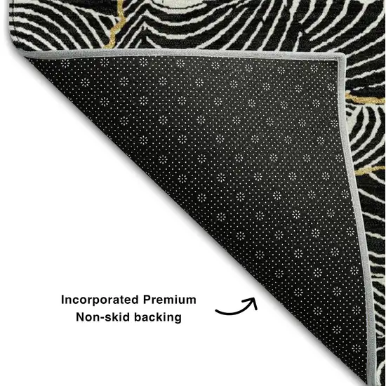 8' Black Ivory And Gold Abstract Washable Round Rug With UV Protection Photo 5
