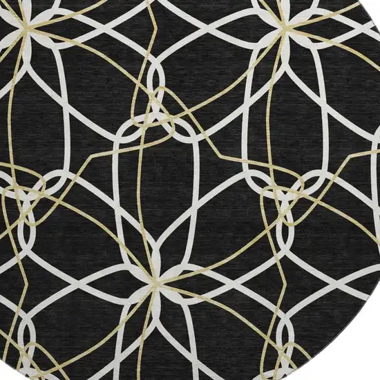 8' Black Ivory And Gold Geometric Washable Round Rug With UV Protection Photo 2