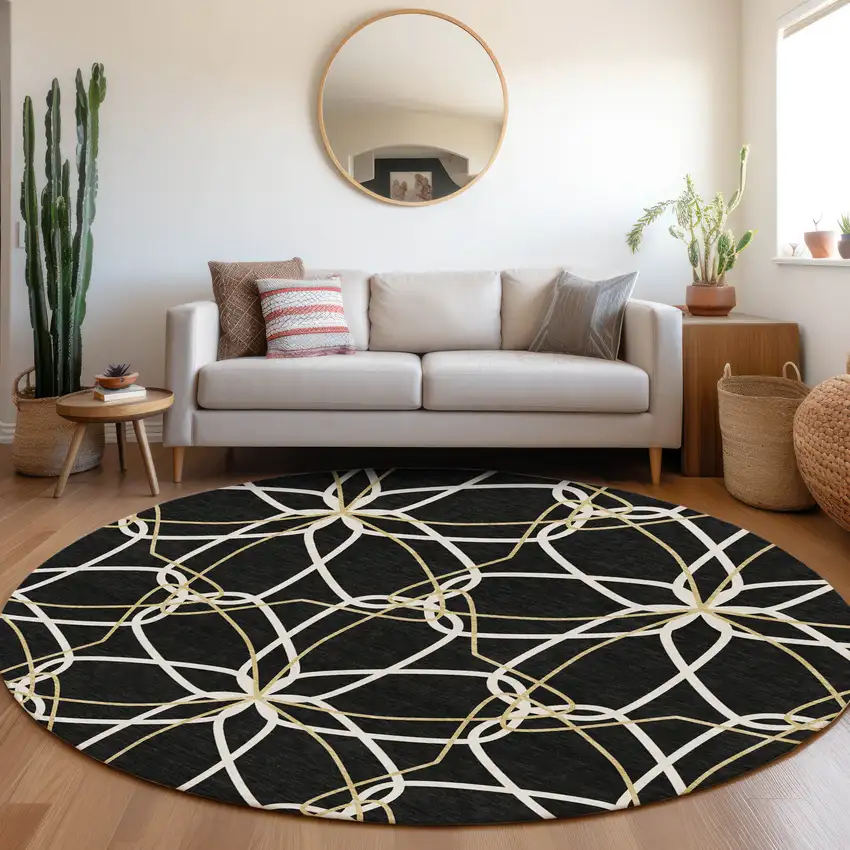 8' Black Ivory And Gold Geometric Washable Round Rug With UV Protection Photo 4