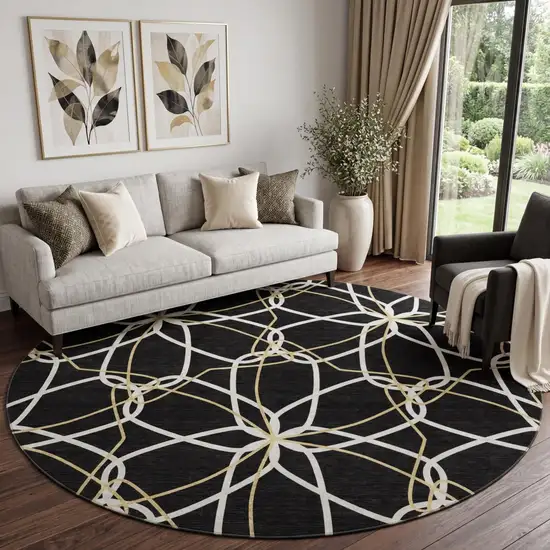 8' Black Ivory And Gold Geometric Washable Round Rug With UV Protection Photo 1