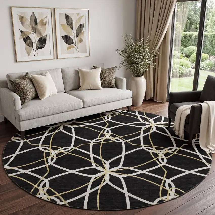 8' Black Ivory And Gold Geometric Washable Round Rug With UV Protection Photo 1