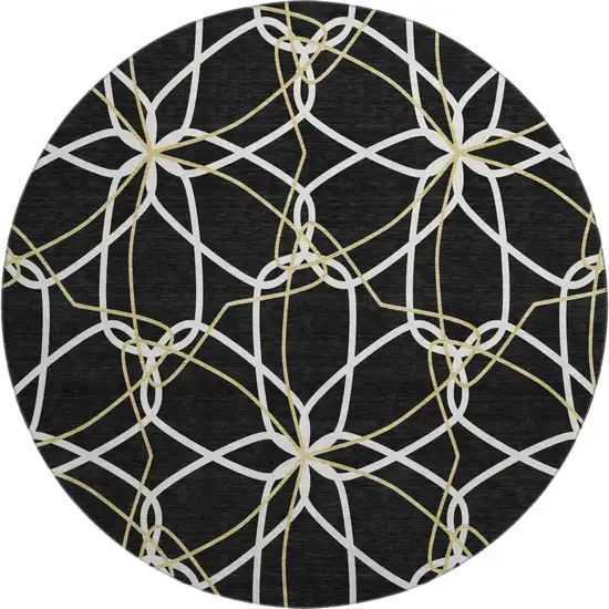 8' Black Ivory And Gold Geometric Washable Round Rug With UV Protection Photo 1