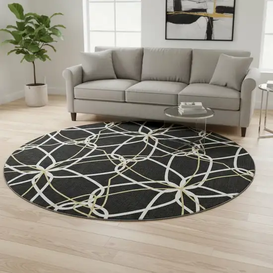 8' Black Ivory And Gold Geometric Washable Round Rug With UV Protection Photo 2