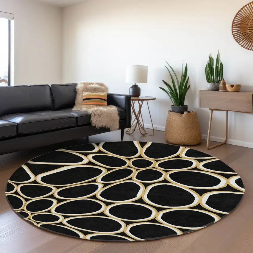8' Black Ivory And Gold Geometric Washable Round Rug With UV Protection Photo 4
