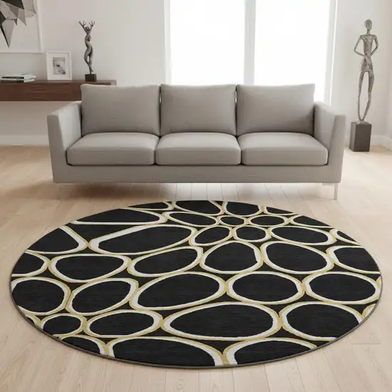 8' Black Ivory And Gold Geometric Washable Round Rug With UV Protection Photo 2