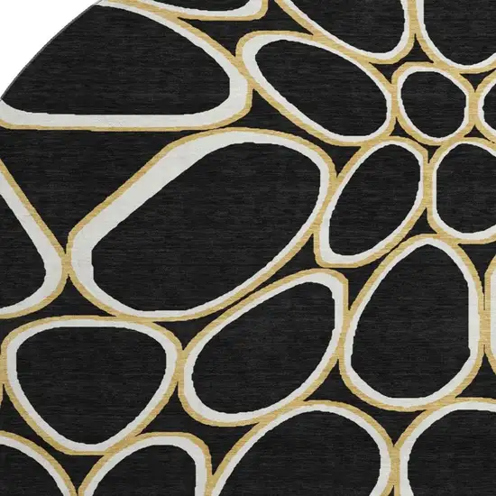 8' Black Ivory And Gold Geometric Washable Round Rug With UV Protection Photo 2