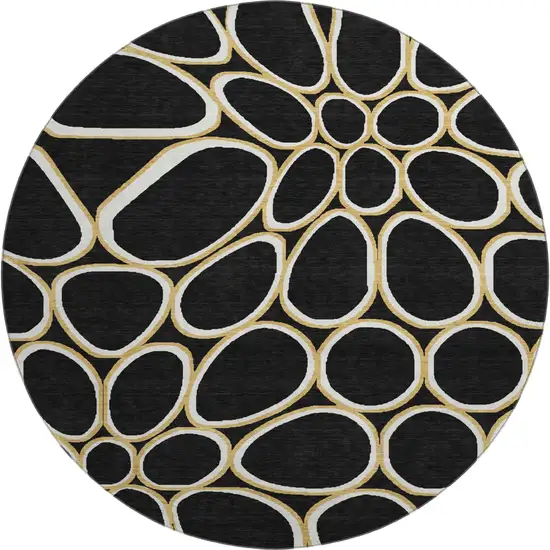 8' Black Ivory And Gold Geometric Washable Round Rug With UV Protection Photo 1