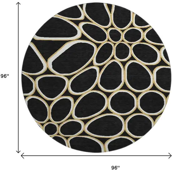 8' Black Ivory And Gold Geometric Washable Round Rug With UV Protection Photo 9
