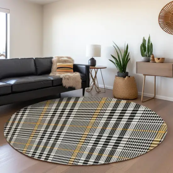 8' Black Ivory And Gold Plaid Washable Round Rug With UV Protection Photo 4
