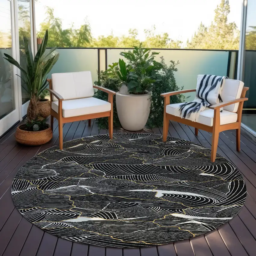 8' Black Ivory And Gold Round Abstract Washable Indoor Outdoor Area Rug Photo 8