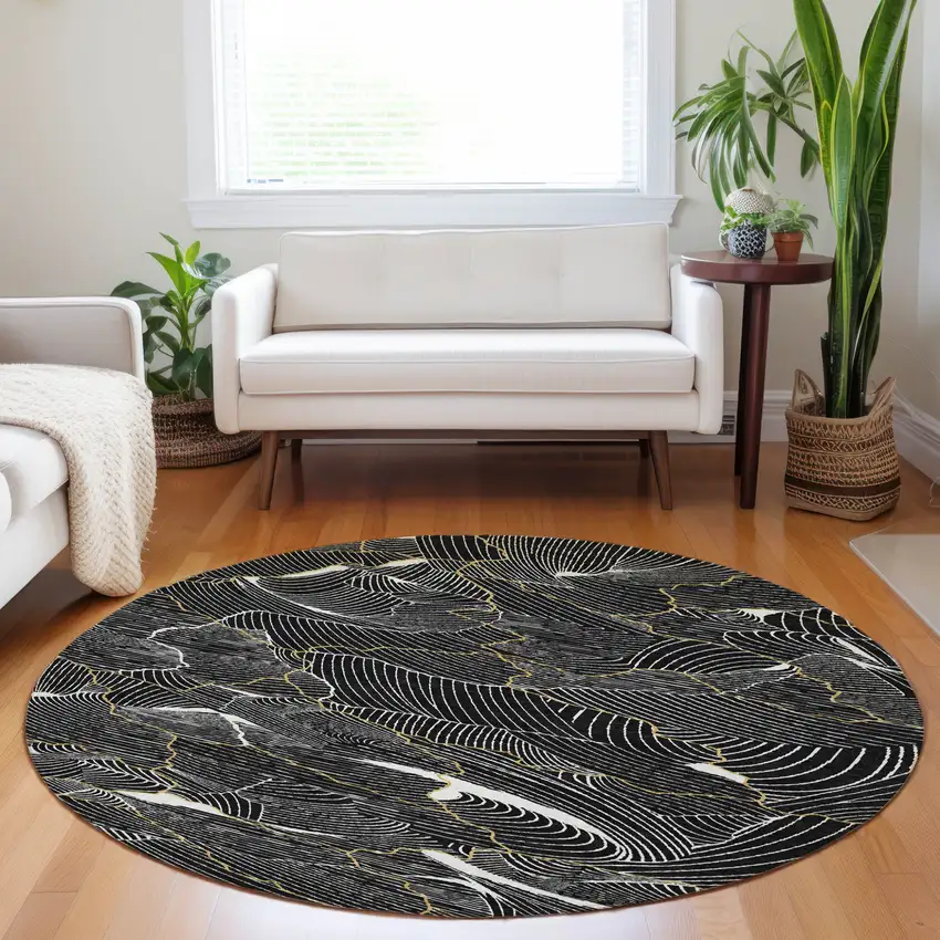 8' Black Ivory And Gold Round Abstract Washable Indoor Outdoor Area Rug Photo 9