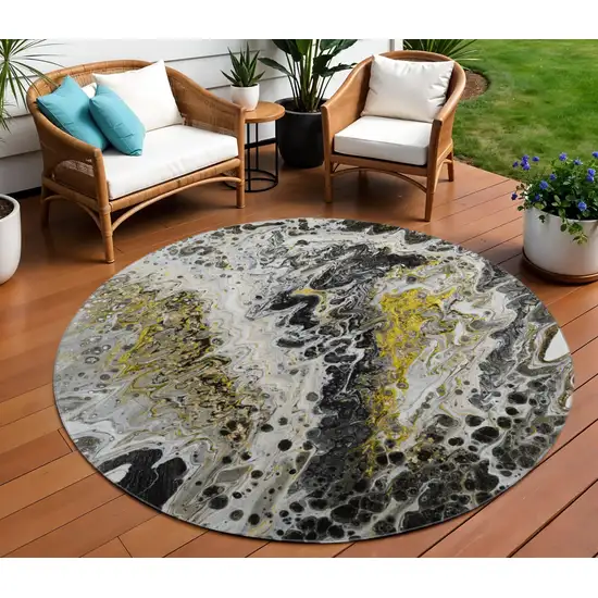 8' Black Ivory And Gold Round Abstract Washable Indoor Outdoor Area Rug Photo 1