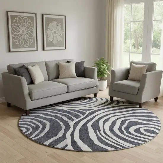 8' Black Ivory And Gray Abstract Washable Round Rug With UV Protection Photo 1