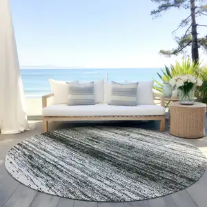 Photo of 8' Black Ivory And Gray Round Striped Washable Indoor Outdoor Area Rug
