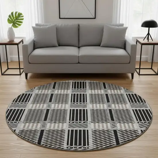 8' Black Ivory And Taupe Plaid Washable Round Rug With UV Protection Photo 2