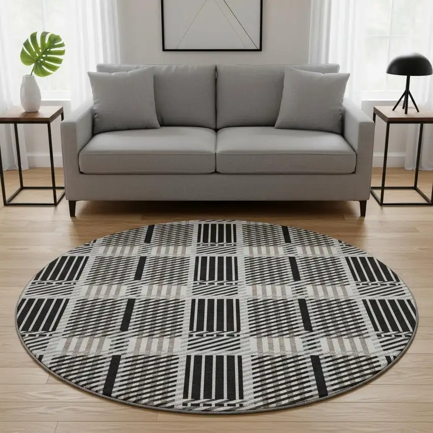 8' Black Ivory And Taupe Plaid Washable Round Rug With UV Protection Photo 2