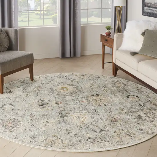 8' Black Mint Green And Ivory Floral Distressed Round Rug Photo 5