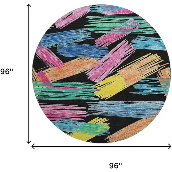 8' Black Pink And Yellow Striped Washable Round Rug With UV Protection Photo 9