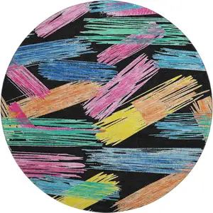 Photo of 8' Black Pink And Yellow Striped Washable Round Rug With UV Protection