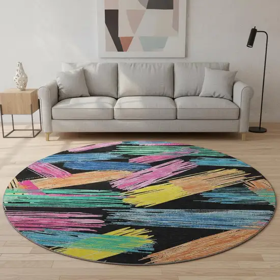 8' Black Pink And Yellow Striped Washable Round Rug With UV Protection Photo 2