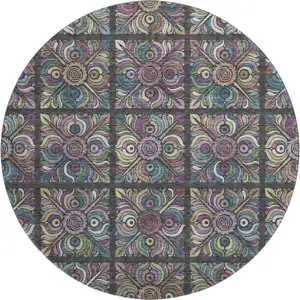 Photo of 8' Black Purple And Teal Medallion Washable Round Rug With UV Protection