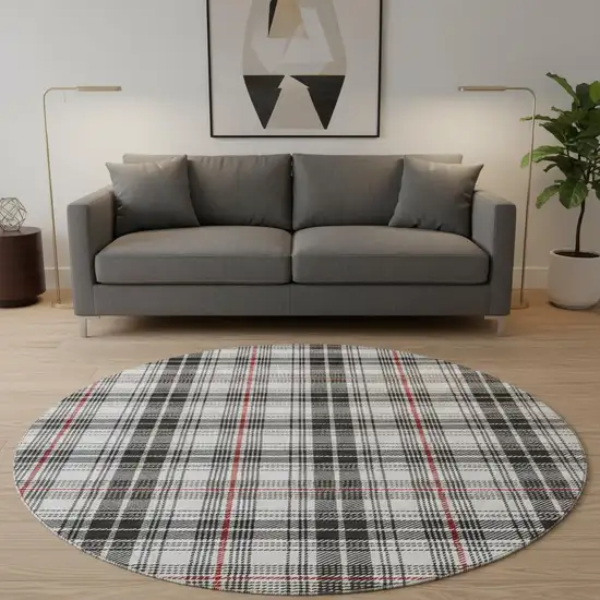 8' Black Red And Ivory Plaid Washable Round Rug With UV Protection Photo 2