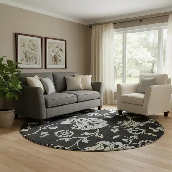 8' Black Silver And Beige Floral Washable Round Rug With UV Protection Photo 1