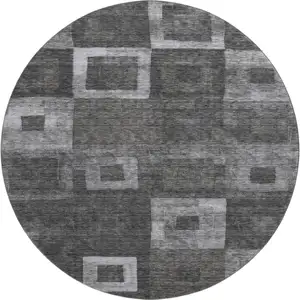 Photo of 8' Black Silver And Gray Geometric Washable Round Rug With UV Protection
