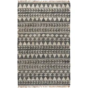 Photo of 8' Black and Ivory Geometric Hand Woven Runner Rug With Fringe