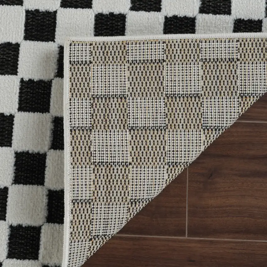 8' Black and White Geometric Distressed Indoor Outdoor Runner Rug Photo 7