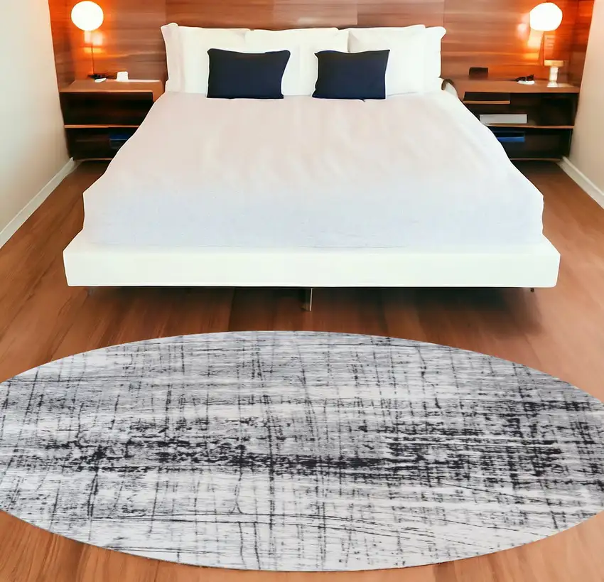 8' Black and White Round Abstract Non Skid Area Rug Photo 1
