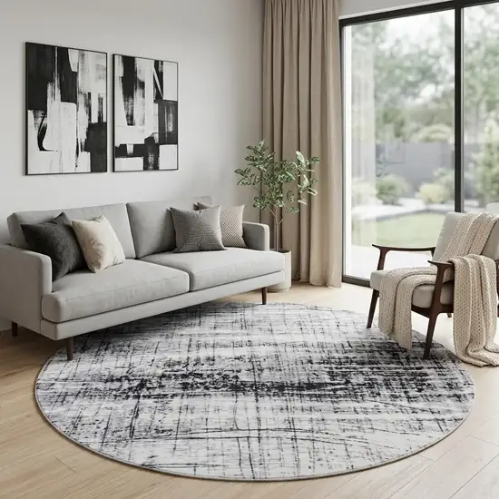 8' Black and White Round Abstract Non Skid Area Rug Photo 1