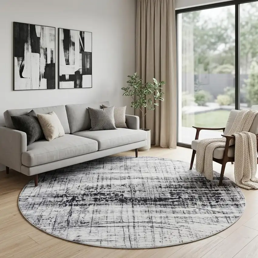 8' Black and White Round Abstract Non Skid Area Rug Photo 1