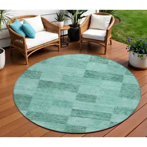 Photo of 8' Blue And Aqua Round Geometric Washable Indoor Outdoor Area Rug