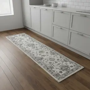 Photo of 9' Blue And Beige Floral Runner Rug