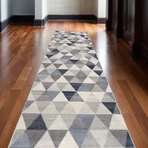 Photo of 18' Blue And Beige Geometric Runner Rug