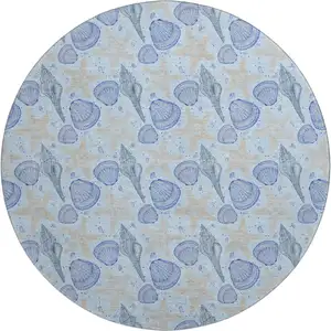 Photo of 8' Blue And Beige Geometric Washable Round Rug With UV Protection