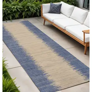 Photo of 10' Blue And Beige Striped Indoor Outdoor Runner Rug
