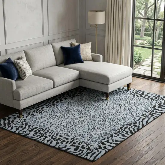 8' Blue And Black Animal Print Washable Area Rug With UV Protection Photo 1