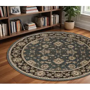 Photo of 8' Blue And Black Floral Round Rug