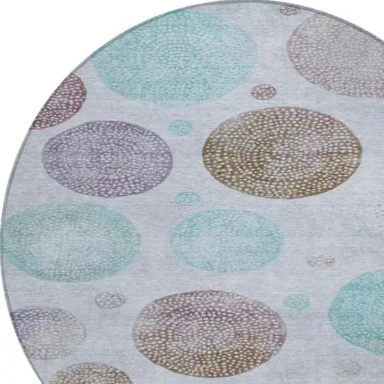 8' Blue And Brown Round Geometric Washable Indoor Outdoor Area Rug Photo 4
