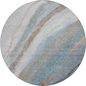 Photo of 8' Blue And Copper Round Abstract Washable Indoor Outdoor Area Rug