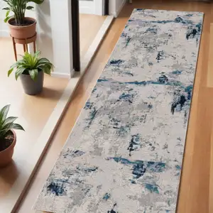 Photo of 6' Blue And Cream Abstract Runner Rug